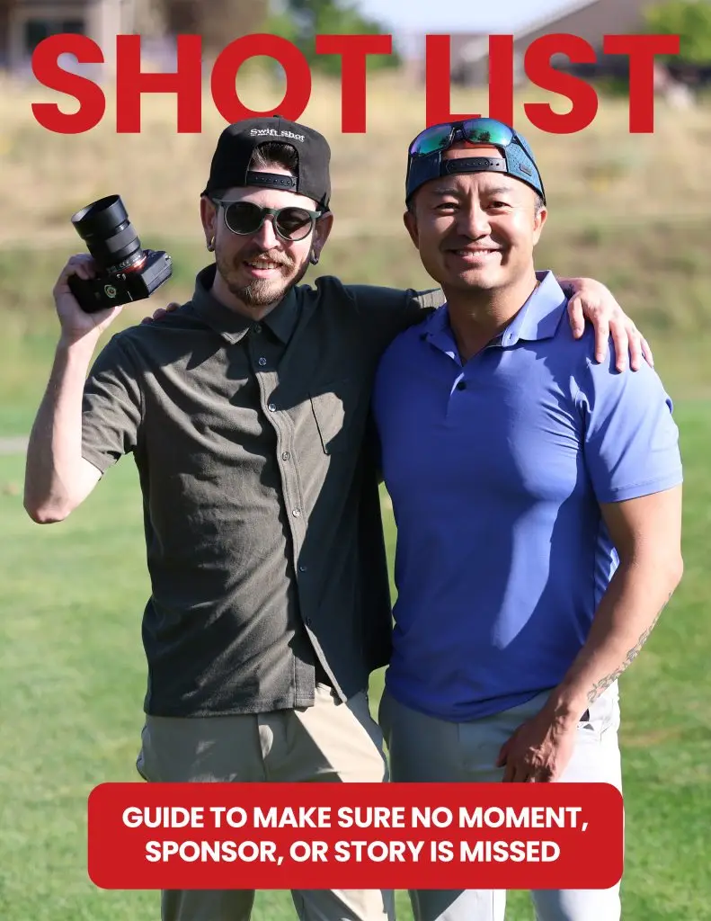 2 photographers with cameras on a golf course fairway