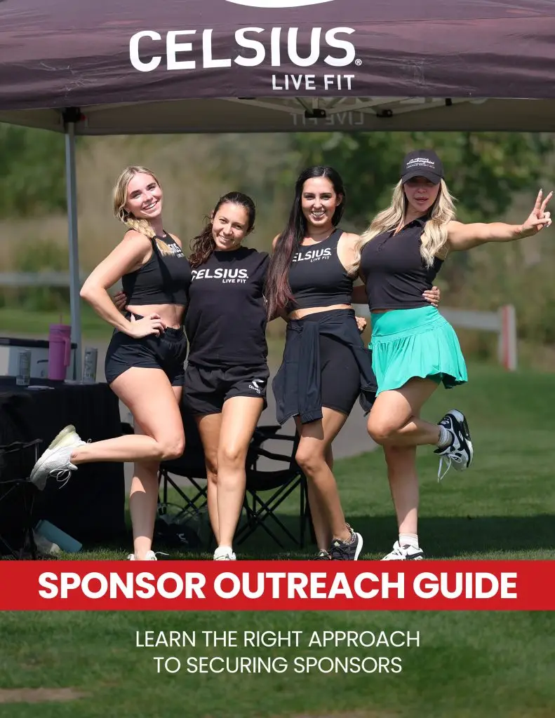 group of 4 girls celebrating under a celsius sponsor tent