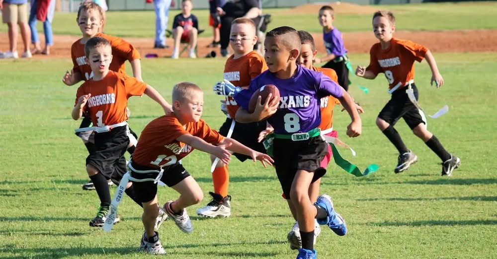 kids playing football