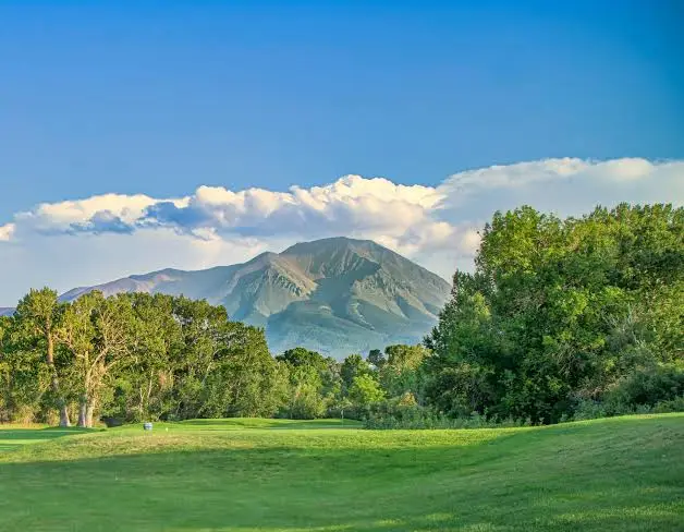 Golf course fairway with Spanish Peaks mountain views at Grandote Peaks Golf Club in La Veta, Colorado