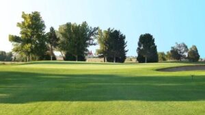 Sand greens and buffalo grass fairway at Hugo Golf Club in Hugo, Colorado
