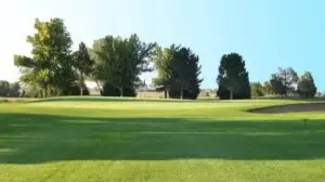 Sand greens and buffalo grass fairway at Hugo Golf Club in Hugo, Colorado