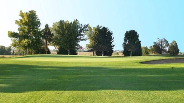 Sand greens and buffalo grass fairway at Hugo Golf Club in Hugo, Colorado