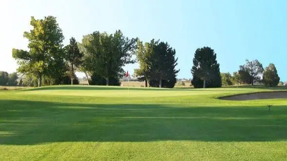 Sand greens and buffalo grass fairway at Hugo Golf Club in Hugo, Colorado