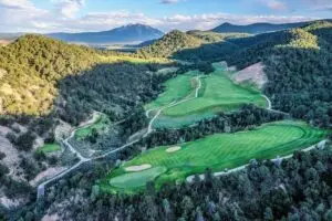 Ironbridge Golf Club, an 18-hole alpine golf course designed by Arthur Hills and Tom Lehman in Glenwood Springs, Colorado