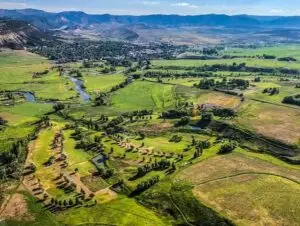 Fairway and greens at Meeker Golf Course with the White River valley scenery, Meeker, Colorado
